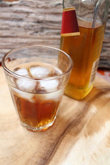 Glass of whiskey with ice