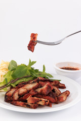 Charcoal boiled pork neck, Grilled Pork Neck, Roasted pork with Thai Spicy on White Background.