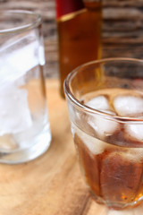 Glass of whiskey with ice