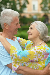 mature couple   in summer park
