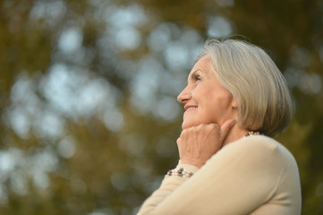 Senior woman in autumn park