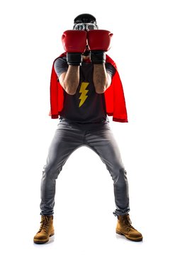 Superhero with boxing gloves covering his face