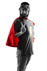 Superhero doing victory gesture
