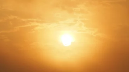 Crédence de cuisine en verre imprimé Ciel Blur beautiful sun and orange sky. Sunset sunrise in background. Abstract orange sky. Dramatic golden sky at the sunset background.