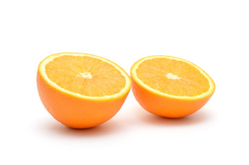 Two pieces of orange isolated on white