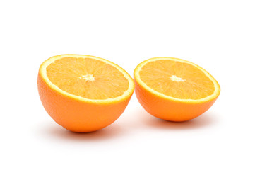 Two pieces of orange isolated on white