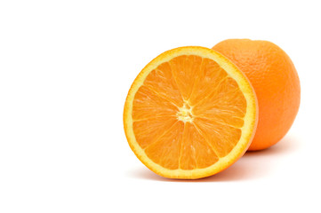 Orange cut in half with a field for the text