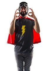 Superhero making OK sign