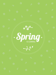 Lettering spring is coming on green background. Branch with leaves and flowers.