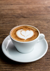 Cup of Cappuccino Coffee with Latte Art.