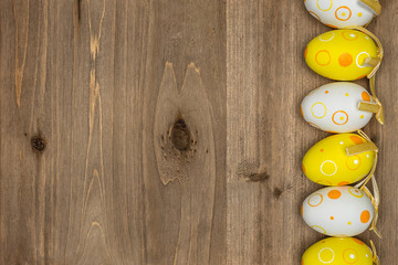 Easter eggs on wooden background