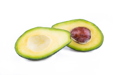 Avocado slices isolated on a white background.