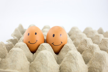 happy egg in egg tray