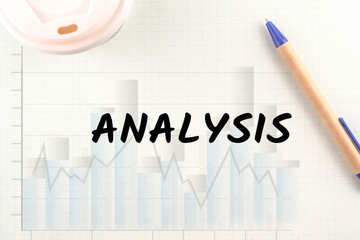 word analysis on graph bar on paper pen and coffee background