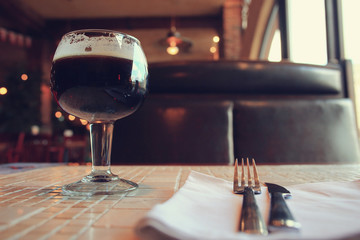 Fototapeta na wymiar glass of wine, a restaurant serving a blurred background