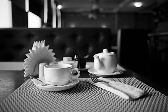 black and white photo restaurant serving