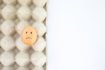 sad Egg in paper tray