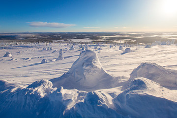 Beautiful cold mountain view of ski resort, sunny winter day with slope, piste and ski lift