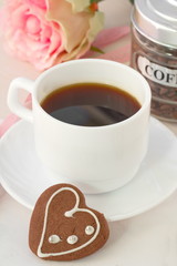 Cup of coffee and chocolate cookies