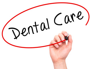 Man Hand writing Dental Care with black marker on visual screen