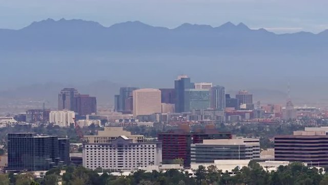 Wide view of the Phoenix Skyline at sunrise. 4K UHD time-lapse. No Logos on buildings.