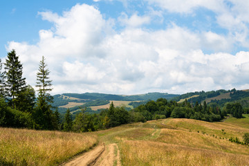 Dirt road against the landscape in the Ukrainian Carpathians