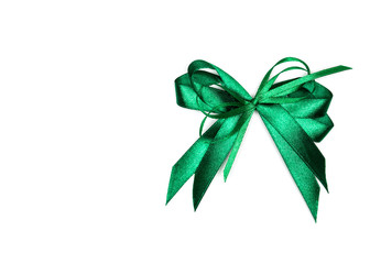 Green satin gift bow. Ribbon. Isolated on white