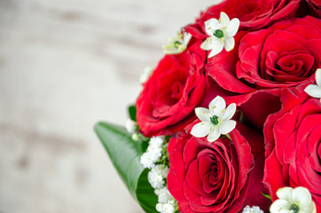 Beautiful bouquets of roses for a wedding with accessories and i