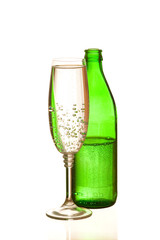 Mineral water in a bottle and a glass