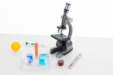 Microscope isolated under the white background