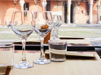 Empty glasses on a restaurant table with copy space