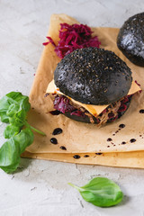 Black burger with stews