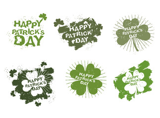 Happy Patricks day logos set in style of grunge. Trace of brush