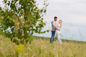 loving couple in the field