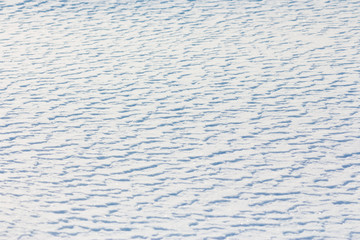 background of white snow made by nature