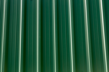 Background with green corrugated metal sheet