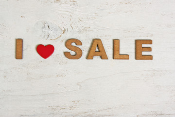 I love sale of wooden letters on a white background old