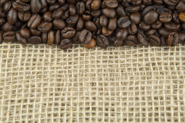 Roasted coffee beans on a linen cloth