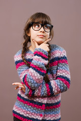 Little nerdy girl thinking 