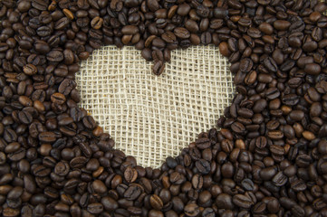 Roasted coffee beans on a linen cloth