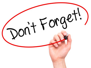 Man Hand writing Don't Forget!  with black marker on visual scre