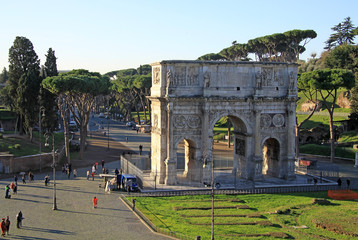 ROME, ITALY - DECEMBER 21, 2012: Arch of Constantine next to the Roman Coliseum, Rome, Italy