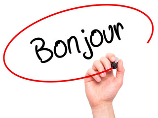 Man Hand writing Bonjour  (Good Morning in French) with black ma © netsay