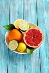 Citrus fruits on a blue wooden table