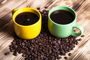 Coffee on wooden table for background. Selective focus
