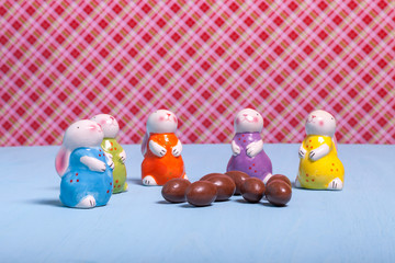 Easter rabbits and eggs on a bright background