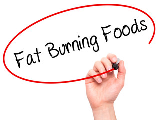 Man Hand writing Fat Burning Foods with black marker on visual s