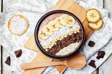 chocolate smoothie with banana, coconut, pine nuts, chocolate an