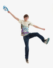 Young guy is dancing. Street dance. White background.