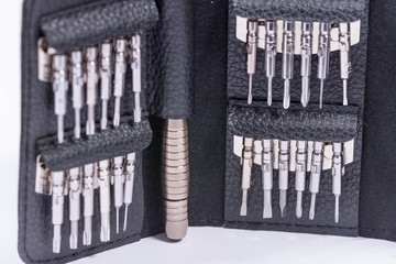 Naklejka premium Screwdriver set in the black leather package